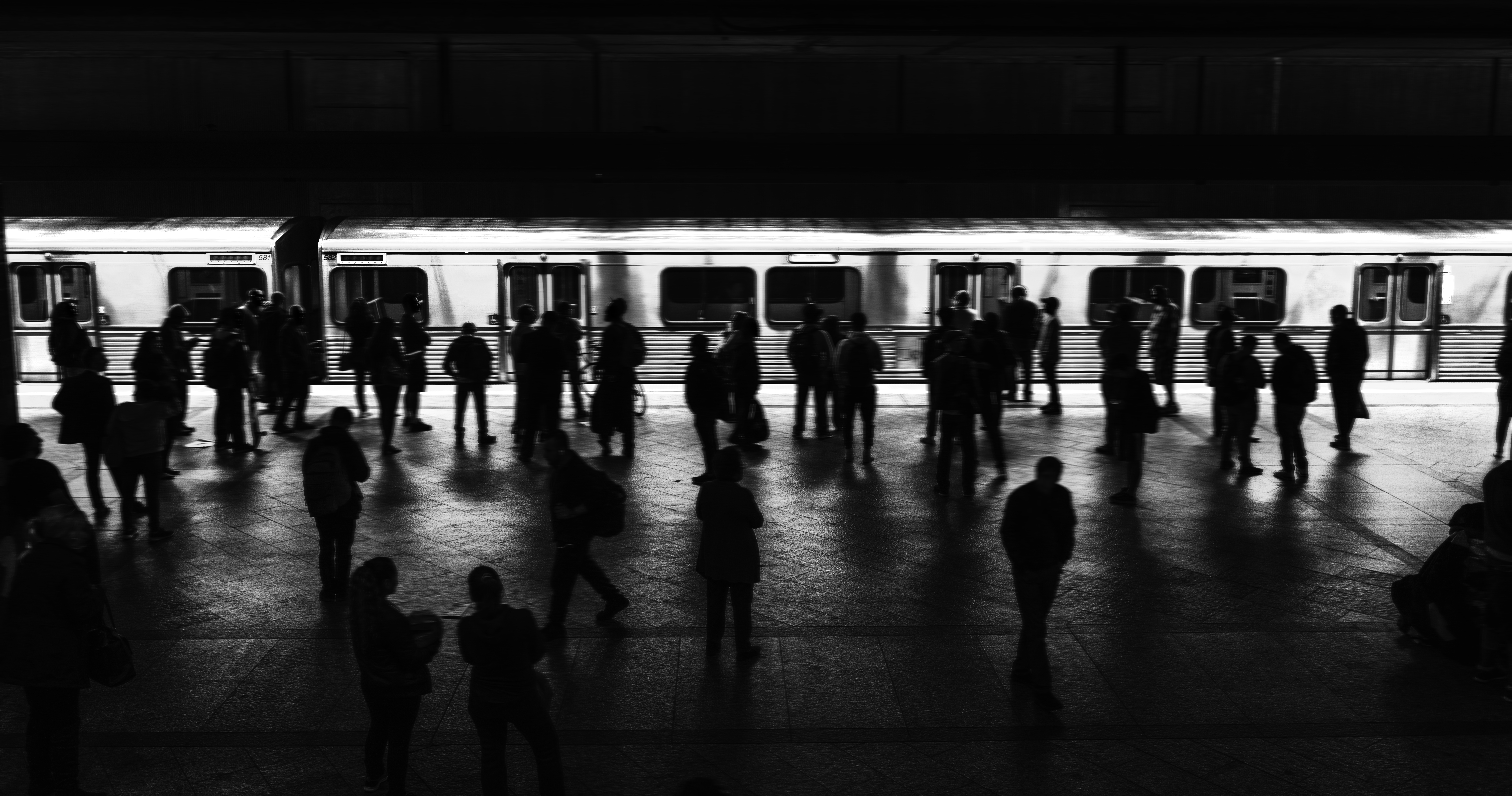 People waiting on a train platform
